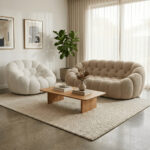 Salon Contemporain Beige Et Blanc Salon contemporain beige et blanc avec fauteuil design, canapé tufté, table basse bois et lumière naturelle