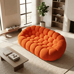 Sofa coconfortable orange corail pour salon moderne.
